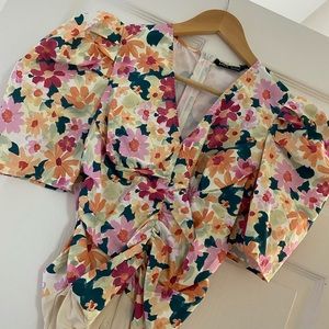 Super cute floral bodysuit